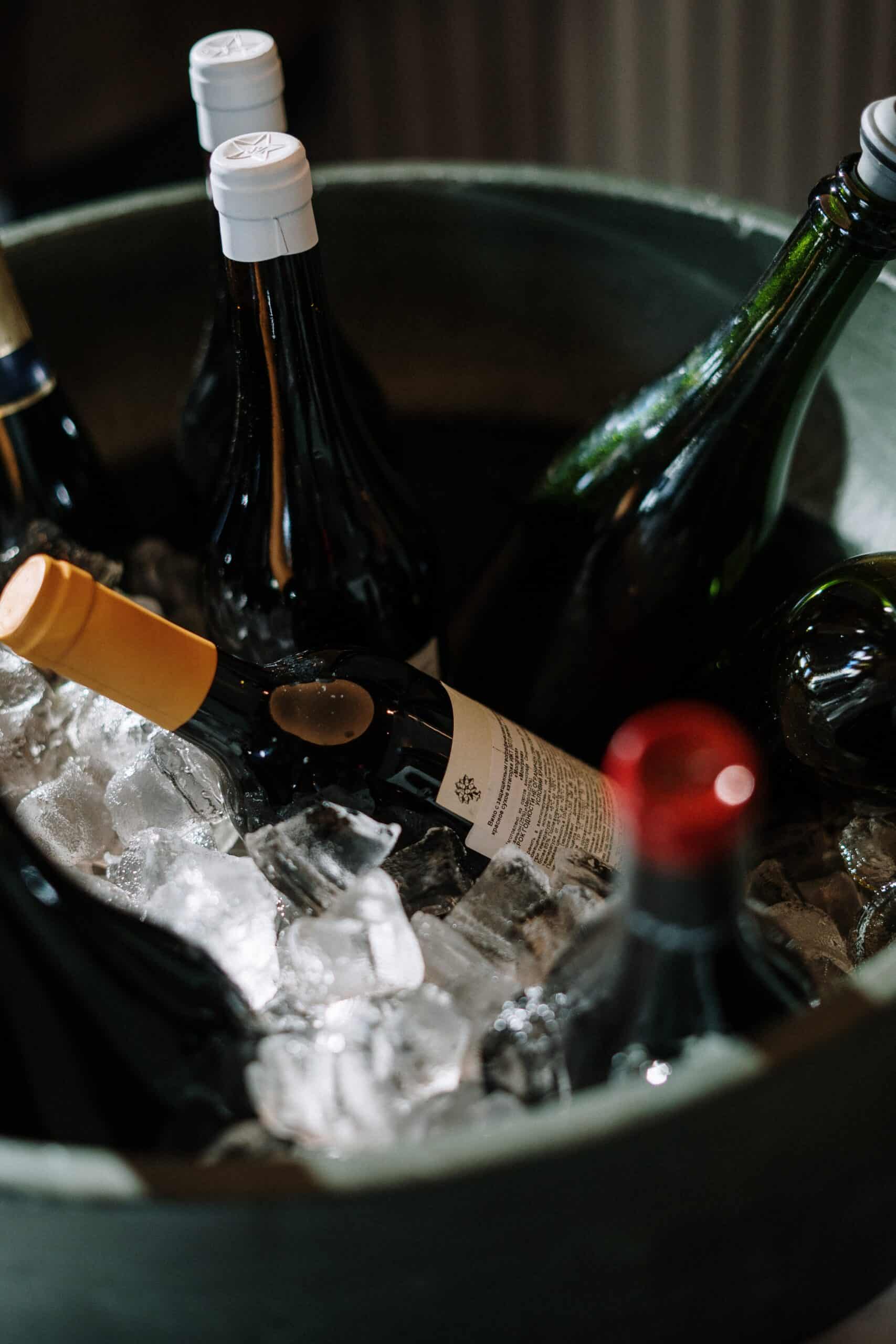 Wine cooled with ice in a wine bucket.